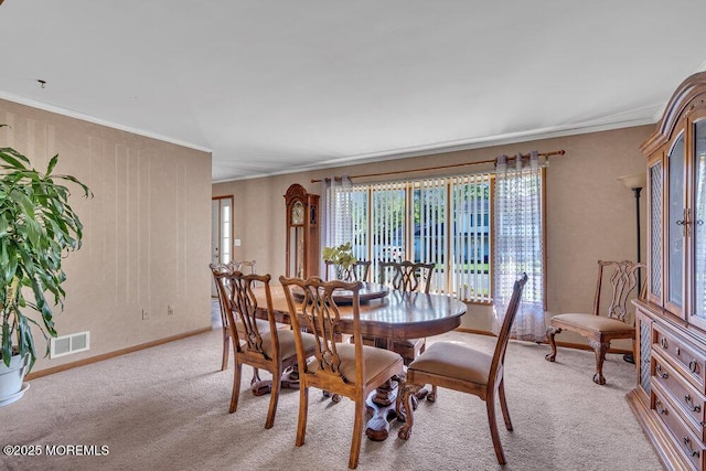 1430 Forest Ave, Brick, NJ 08724 - dining room with light carpet, ornamental molding, and baseboards