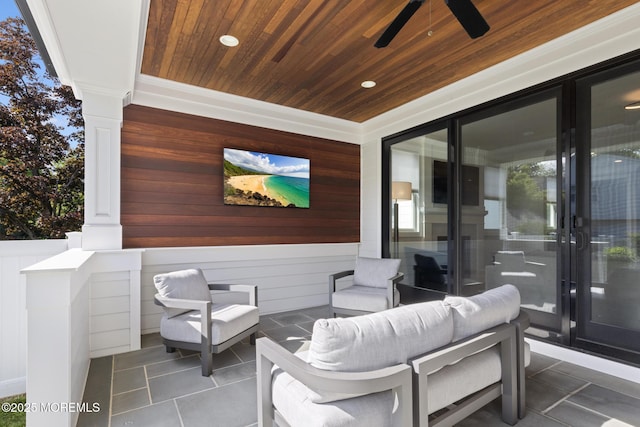 view of patio / terrace with a ceiling fan and an outdoor hangout area