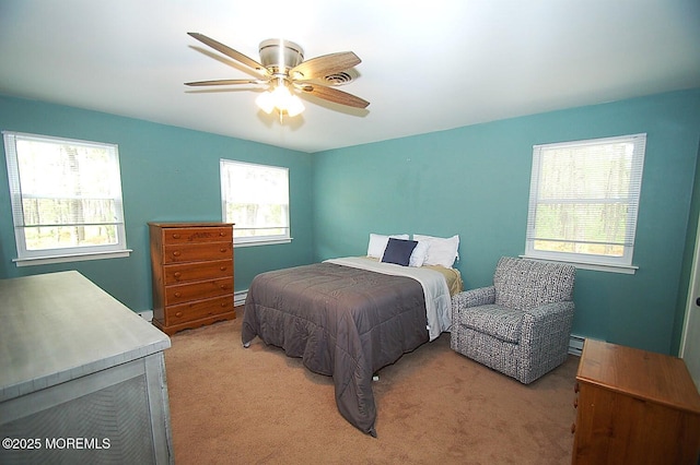 5 Brooklane Ct Unit 60, Manchester, NJ 08759 - bedroom with light colored carpet, a ceiling fan, and baseboard heating