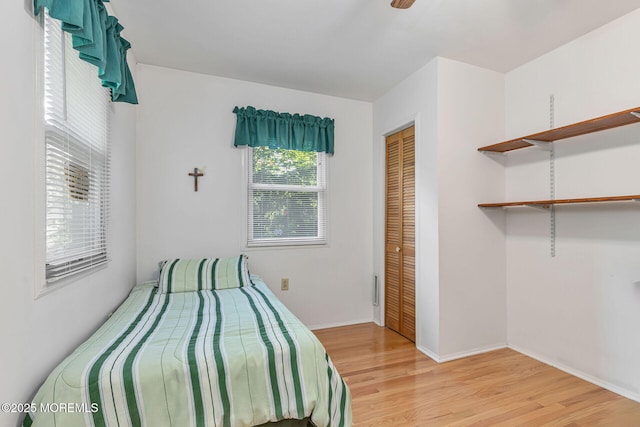 32 Sears Ave, Atlantic Highlands, NJ 07716 - bedroom with light wood-type flooring, a closet, and baseboards