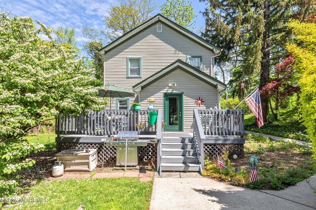 32 Sears Ave, Atlantic Highlands, NJ 07716 - view of front of house featuring a wooden deck