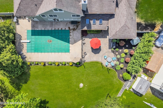 drone / aerial view of a pool