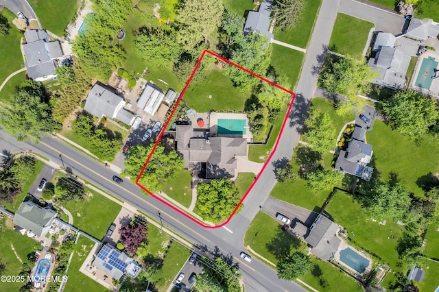 aerial perspective of suburban area featuring property parcel outlined