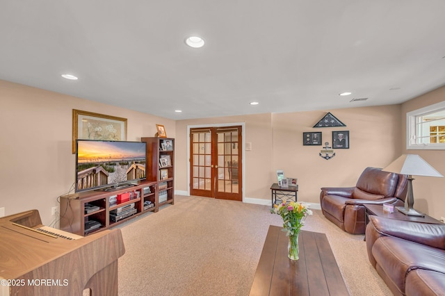 living area featuring french doors, carpet, recessed lighting, and baseboards