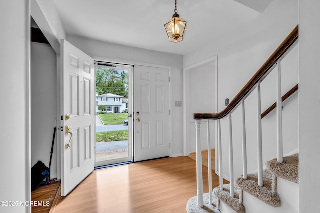 132 Tunes Brook Dr, Brick, NJ 08723 - entryway with stairway and light wood finished floors