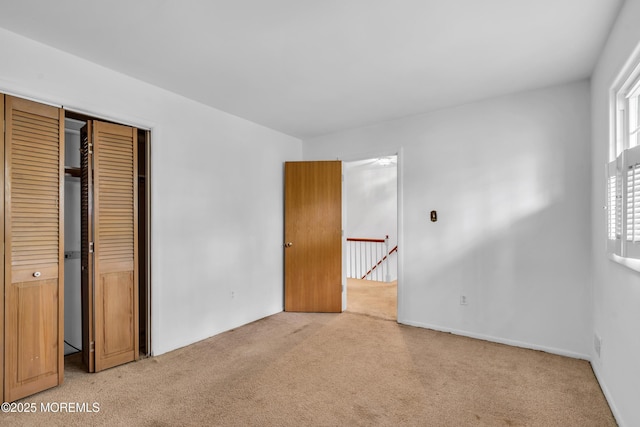 132 Tunes Brook Dr, Brick, NJ 08723 - unfurnished bedroom featuring light colored carpet and a closet