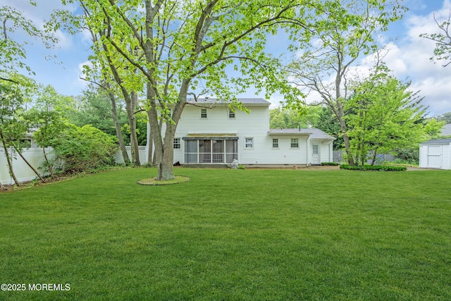 132 Tunes Brook Dr, Brick, NJ 08723 - back of house with a sunroom, a storage unit, and an outbuilding