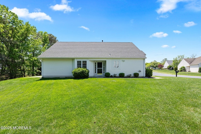 view of front of property with a front lawn