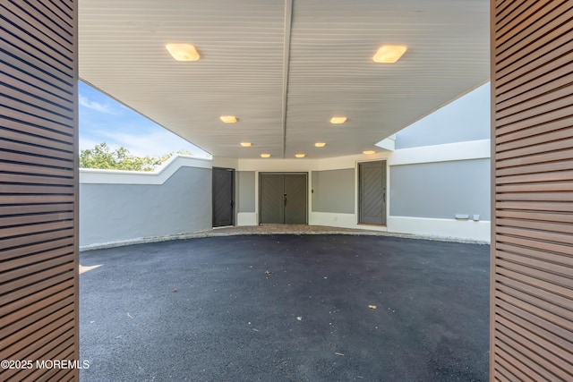 401 Overlook Dr, Neptune Township, NJ 07753 - view of patio featuring a carport