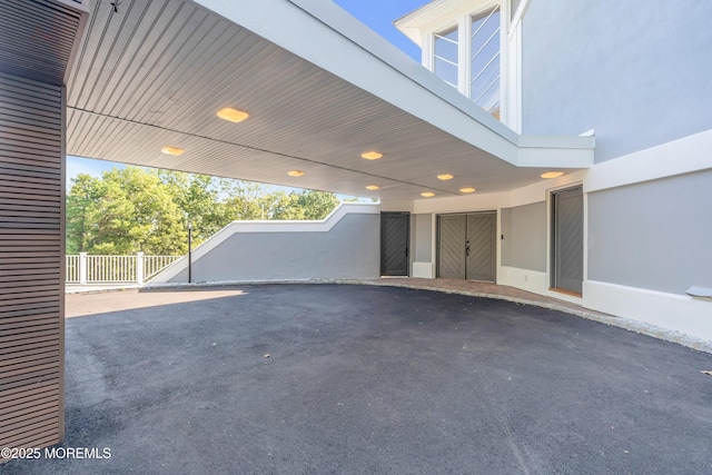 401 Overlook Dr, Neptune Township, NJ 07753 - view of vehicle parking with fence and a carport