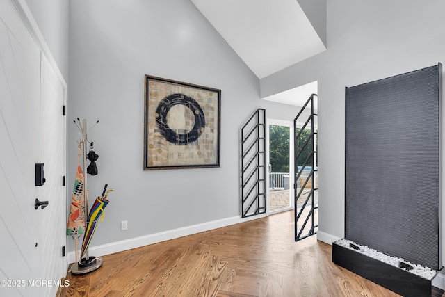 401 Overlook Dr, Neptune Township, NJ 07753 - entrance foyer with baseboards and high vaulted ceiling
