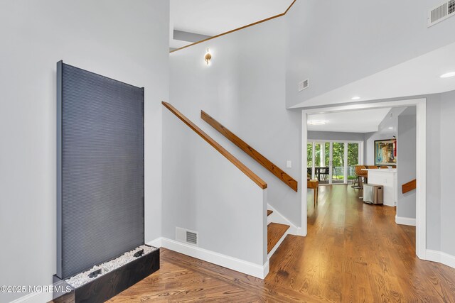 401 Overlook Dr, Neptune Township, NJ 07753 - entrance foyer with wood finished floors, baseboards, stairway, and recessed lighting