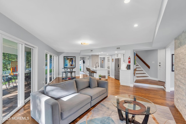 401 Overlook Dr, Neptune Township, NJ 07753 - living room featuring stairs, light wood finished floors, baseboards, and recessed lighting