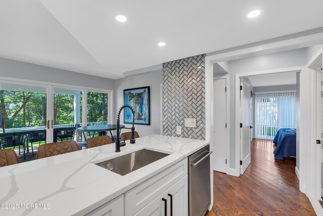 401 Overlook Dr, Neptune Township, NJ 07753 - kitchen featuring a sink, stainless steel dishwasher, light stone counters, plenty of natural light, and recessed lighting