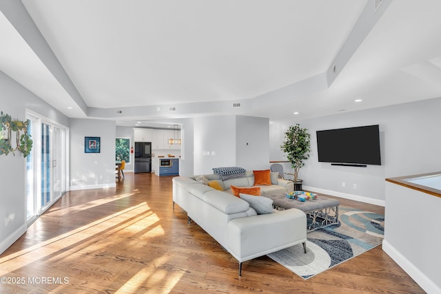 401 Overlook Dr, Neptune Township, NJ 07753 - living room with wood finished floors, recessed lighting, baseboards, and vaulted ceiling