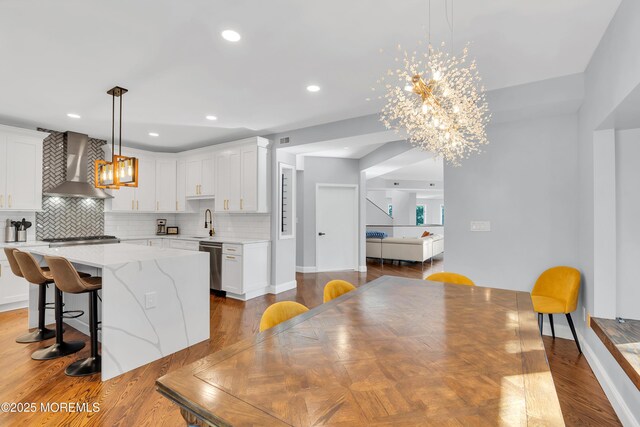 401 Overlook Dr, Neptune Township, NJ 07753 - dining space featuring a chandelier, baseboards, wood finished floors, and recessed lighting