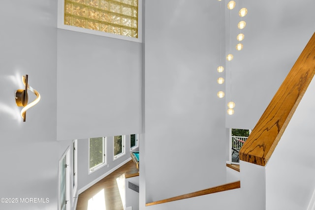 401 Overlook Dr, Neptune Township, NJ 07753 - staircase featuring a high ceiling and wood finished floors