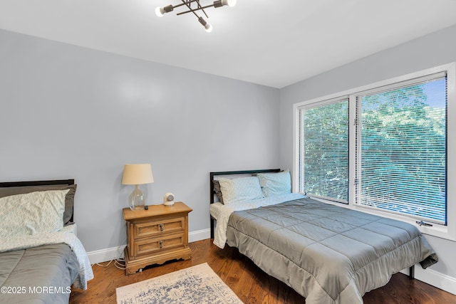 401 Overlook Dr, Neptune Township, NJ 07753 - bedroom featuring baseboards, wood finished floors, and a chandelier
