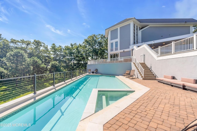 401 Overlook Dr, Neptune Township, NJ 07753 - view of swimming pool featuring stairs, a patio area, fence, and a pool with connected hot tub