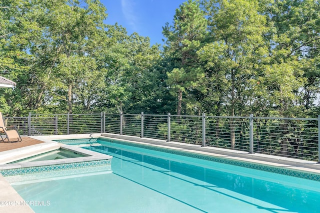 401 Overlook Dr, Neptune Township, NJ 07753 - view of pool with an in-ground hot tub and view of wooded area