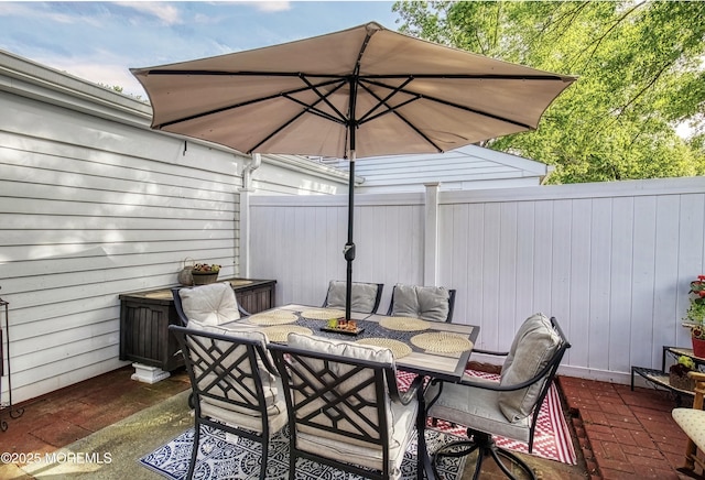 467A Chelsea Ct, Manchester, NJ 08759 - view of patio featuring outdoor dining area and a fenced backyard