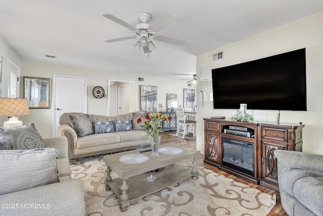 467A Chelsea Ct, Manchester, NJ 08759 - living area featuring a ceiling fan and wood finished floors