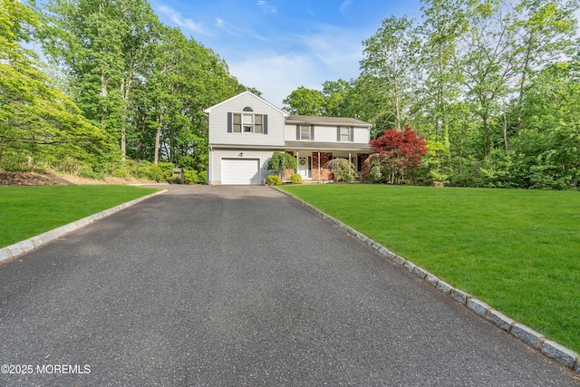 6 Blanche Dr, New Egypt, NJ 08533 - view of front of home with a garage, a porch, asphalt driveway, and a front yard