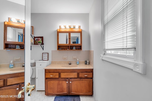 6 Blanche Dr, New Egypt, NJ 08533 - bathroom featuring decorative backsplash and two vanities