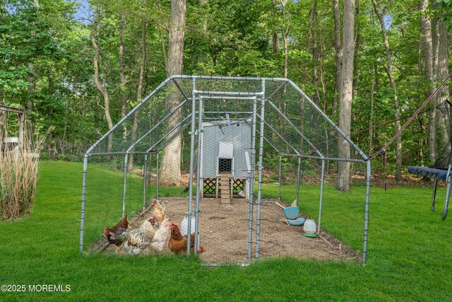 6 Blanche Dr, New Egypt, NJ 08533 - view of play area featuring exterior structure, a yard, and an outdoor structure