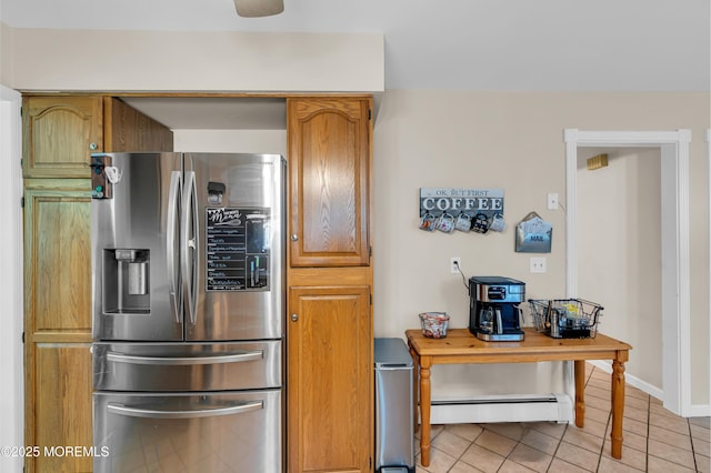 6 Blanche Dr, New Egypt, NJ 08533 - kitchen with stainless steel fridge with ice dispenser, baseboard heating, light tile patterned floors, and baseboards
