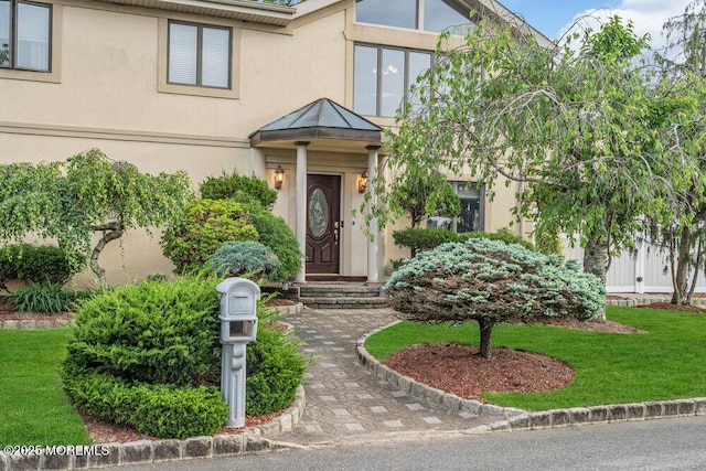 251 Genes Dr, Toms River, NJ 08753 - view of front facade with stucco siding and a front yard