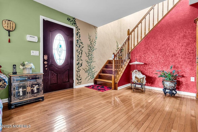 251 Genes Dr, Toms River, NJ 08753 - entryway with wood-type flooring, stairway, and baseboards