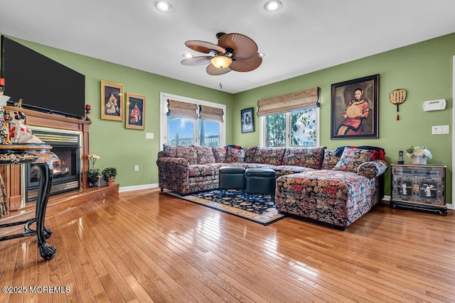 251 Genes Dr, Toms River, NJ 08753 - living area featuring hardwood / wood-style flooring, ceiling fan, a glass covered fireplace, recessed lighting, and baseboards