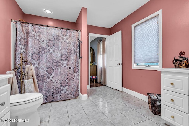 251 Genes Dr, Toms River, NJ 08753 - bathroom featuring tile patterned flooring, toilet, baseboards, and a shower with curtain