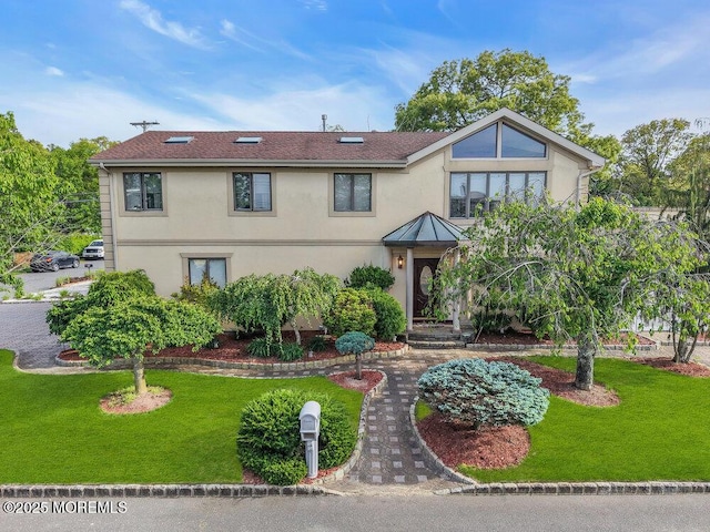251 Genes Dr, Toms River, NJ 08753 - view of front of property featuring stucco siding, a front lawn, and a shingled roof