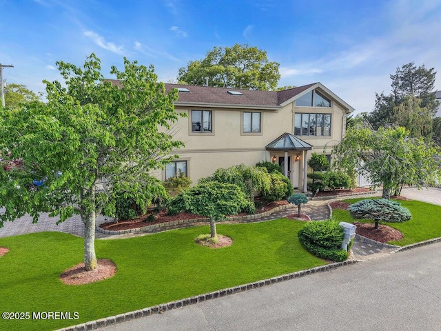 251 Genes Dr, Toms River, NJ 08753 - english style home featuring stucco siding and a front yard