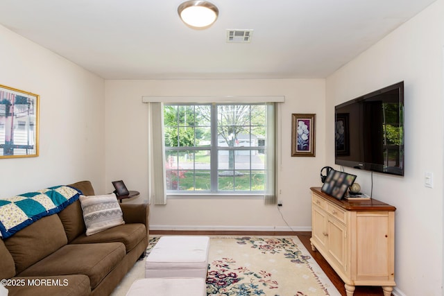 102 Clear Lake Rd, Whiting, NJ 08759 - living area with baseboards and wood finished floors
