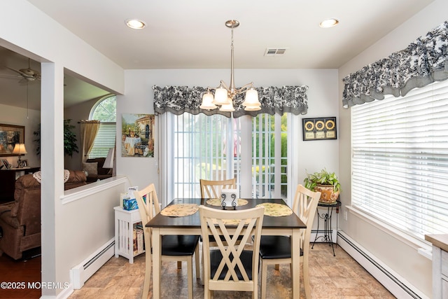 102 Clear Lake Rd, Whiting, NJ 08759 - dining space with a baseboard heating unit, a chandelier, recessed lighting, ceiling fan, and stone finish flooring