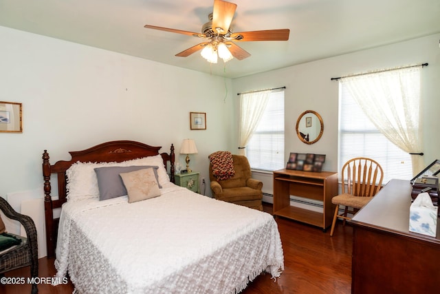 102 Clear Lake Rd, Whiting, NJ 08759 - bedroom featuring dark wood-style flooring, a ceiling fan, and a baseboard heating unit
