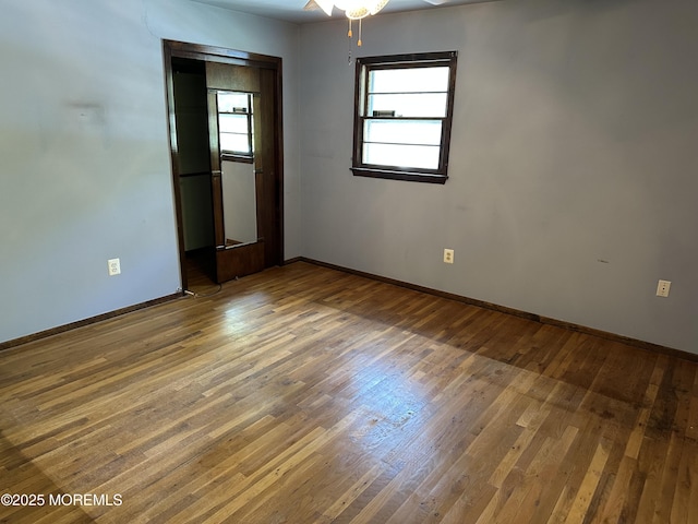 697 Vaughn Ave, Toms River, NJ 08753 - unfurnished room with baseboards, hardwood / wood-style floors, and ceiling fan