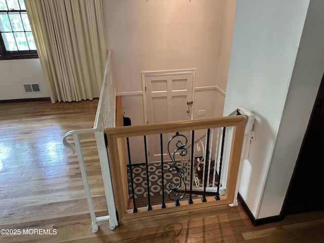 697 Vaughn Ave, Toms River, NJ 08753 - stairway with wood finished floors and baseboards