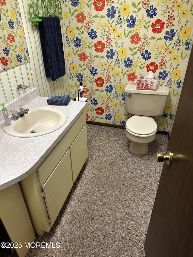 697 Vaughn Ave, Toms River, NJ 08753 - bathroom featuring wallpapered walls, toilet, vanity, and baseboards