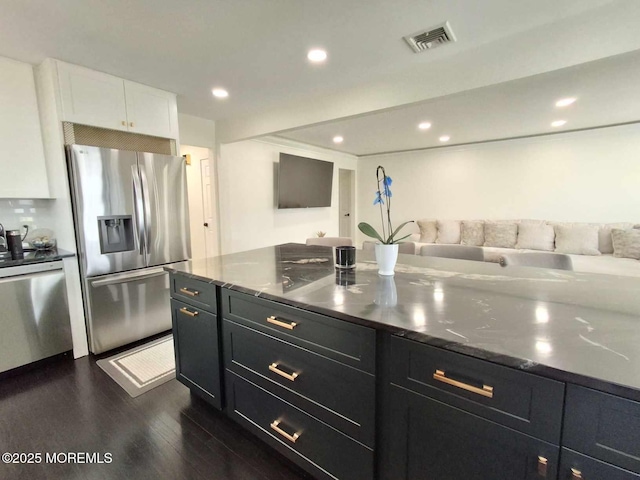 22 Macedulski Ter, South Amboy, NJ 08879 - kitchen with stainless steel appliances, white cabinets, dark cabinetry, dark wood-style flooring, and open floor plan