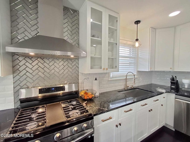 22 Macedulski Ter, South Amboy, NJ 08879 - kitchen with wall chimney exhaust hood, appliances with stainless steel finishes, tasteful backsplash, and white cabinets