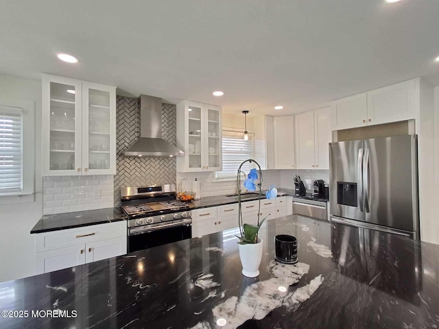 22 Macedulski Ter, South Amboy, NJ 08879 - kitchen featuring stainless steel appliances, wall chimney exhaust hood, backsplash, white cabinetry, and recessed lighting