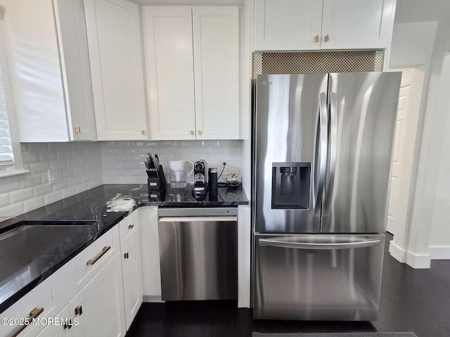 22 Macedulski Ter, South Amboy, NJ 08879 - kitchen featuring stainless steel appliances, white cabinetry, decorative backsplash, and dark stone counters