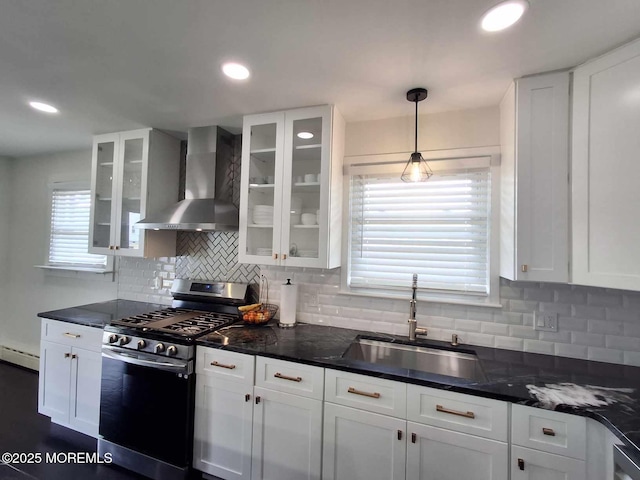 22 Macedulski Ter, South Amboy, NJ 08879 - kitchen featuring wall chimney range hood, stainless steel range with gas stovetop, baseboard heating, white cabinets, and recessed lighting