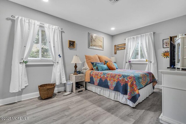 40 Mallard St Unit B, Manchester, NJ 08759 - bedroom with wood finished floors, recessed lighting, and baseboards