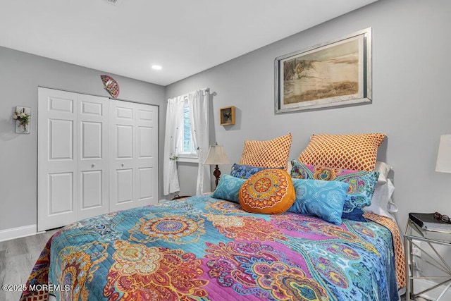 40 Mallard St Unit B, Manchester, NJ 08759 - bedroom with wood finished floors, a closet, baseboards, and recessed lighting
