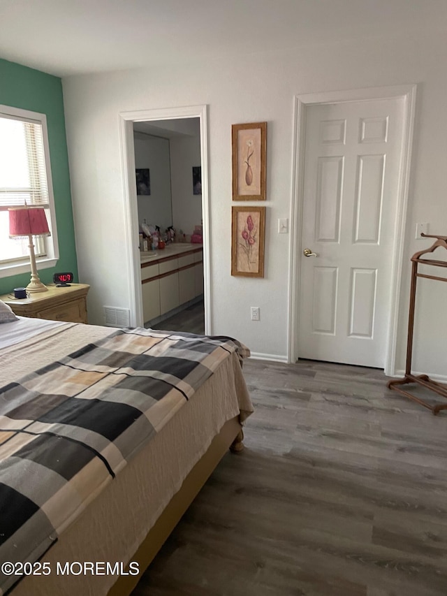 518 Petunia Ln N, Whiting, NJ 08759 - bedroom featuring dark wood-style flooring and baseboards